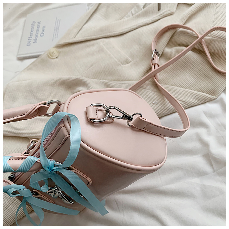 Women's Medium Pu Leather Solid Color Bow Knot Streetwear Cylindrical Zipper Crossbody Bag display picture 2