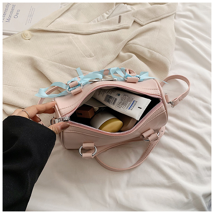Women's Medium Pu Leather Solid Color Bow Knot Streetwear Cylindrical Zipper Crossbody Bag display picture 4