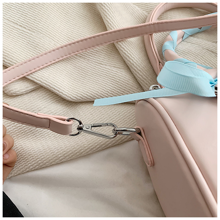 Women's Medium Pu Leather Solid Color Bow Knot Streetwear Cylindrical Zipper Crossbody Bag display picture 6