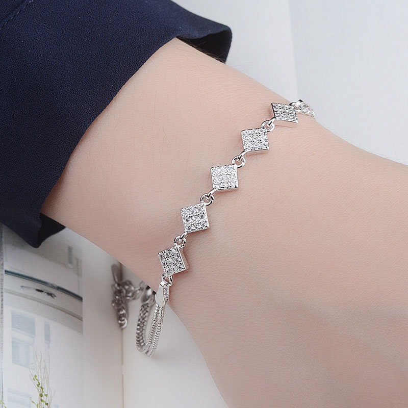 Wholesale Shiny Rhombus Copper Inlay White Gold Plated Zircon Bracelets display picture 2