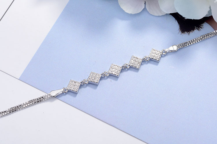 Wholesale Shiny Rhombus Copper Inlay White Gold Plated Zircon Bracelets display picture 3