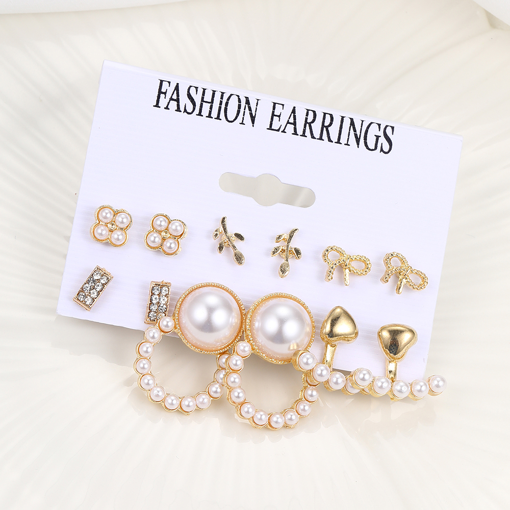 1 Set Casual Retro Heart Shape Bow Knot Inlay Alloy Artificial Pearls Earrings display picture 11