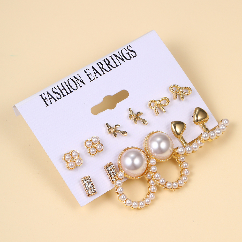 1 Set Casual Retro Heart Shape Bow Knot Inlay Alloy Artificial Pearls Earrings display picture 4