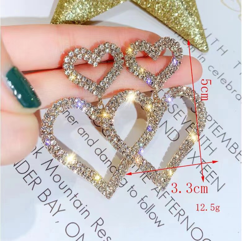 1 Pair Exaggerated Simple Style Korean Style Oval Heart Shape Snowflake Plating Inlay Alloy Rhinestones Pearl Gold Plated Silver Plated Earrings display picture 25